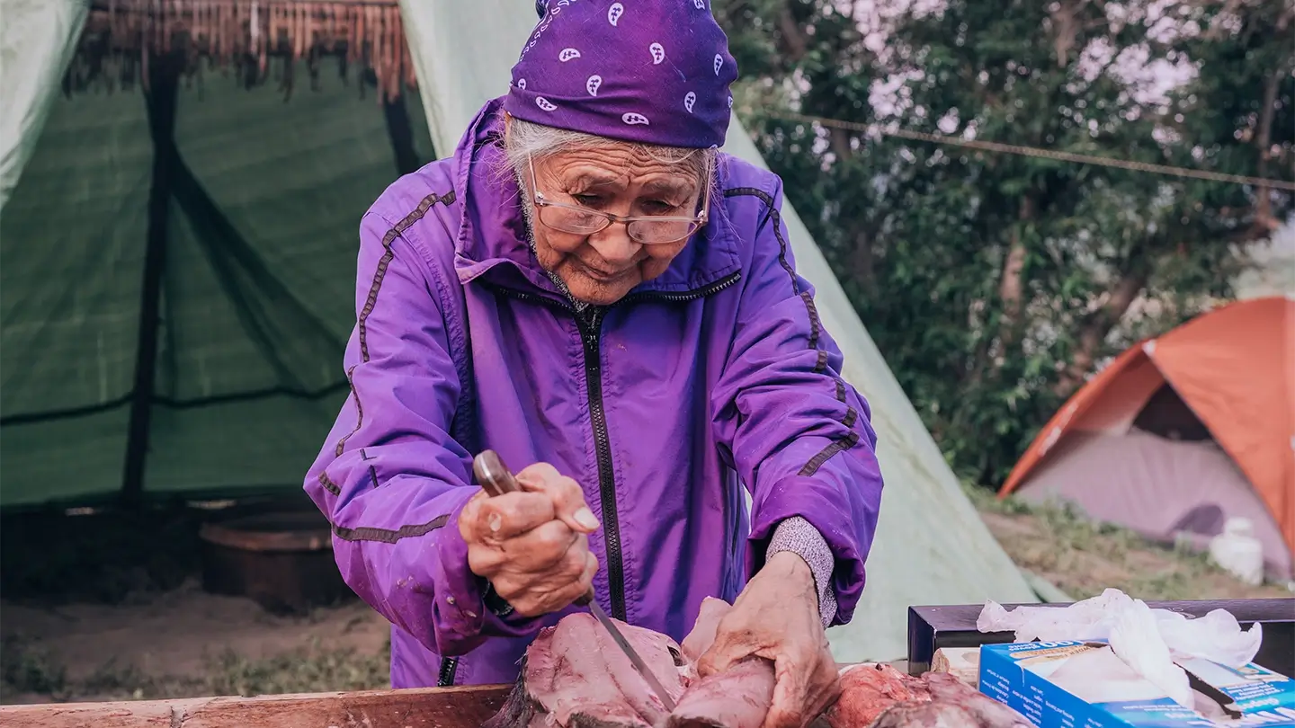 Woman making dry fish