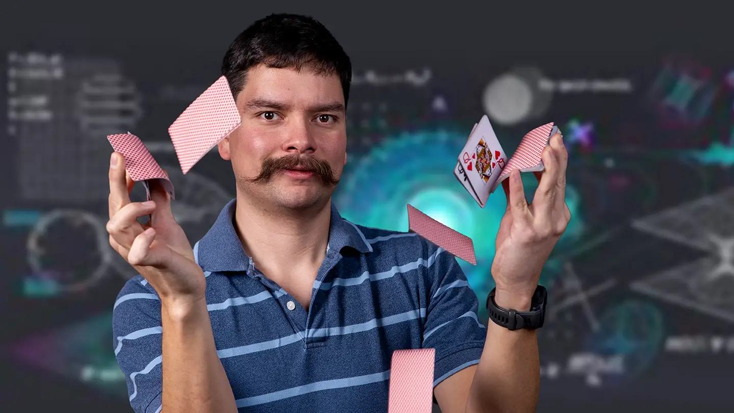 Benjamin Anderson-Sackaney flips a deck of playing cards in the air.