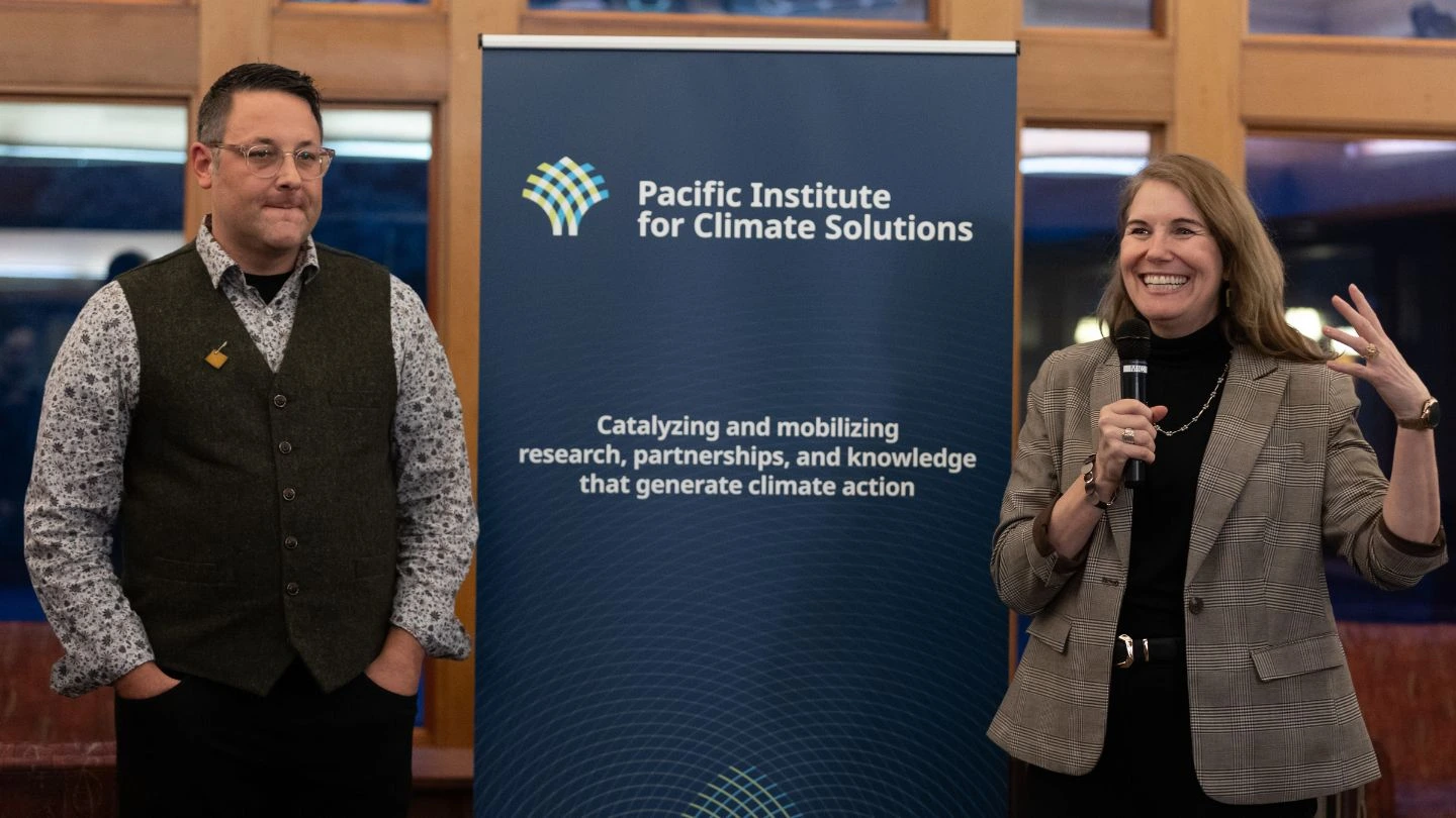 Diana Gibson, MLA for the riding that includes UVic (Oak Bay-Gordon Head), speaks at a reception before the main event with PICS Executive Director Ian Mauro. 