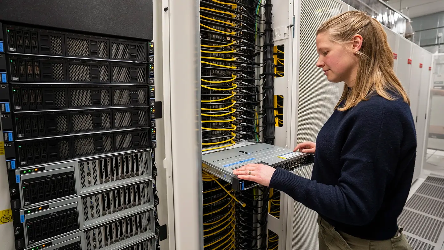 Sarah Huber looks at computer equipment.