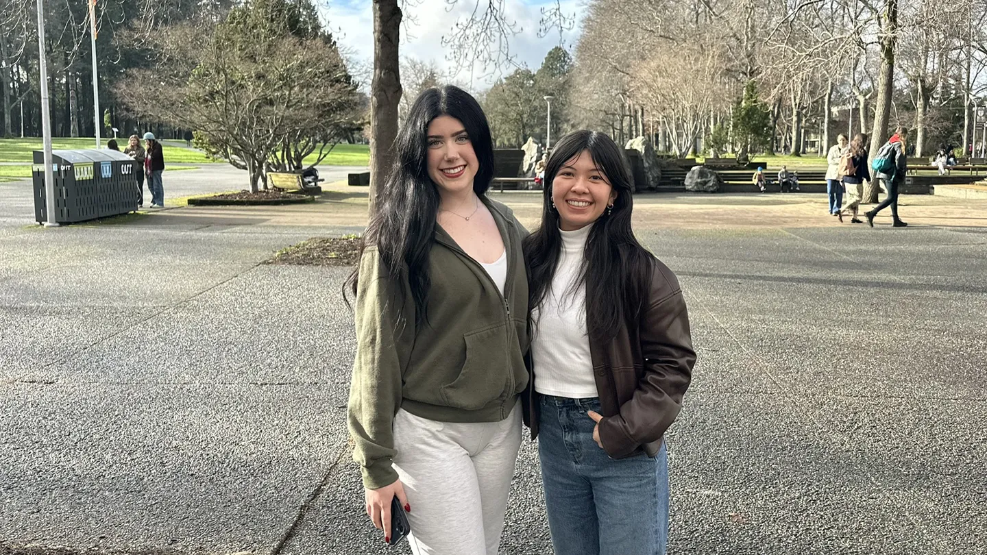 Students from the FYI Program smile while standing in the UVic Quad.